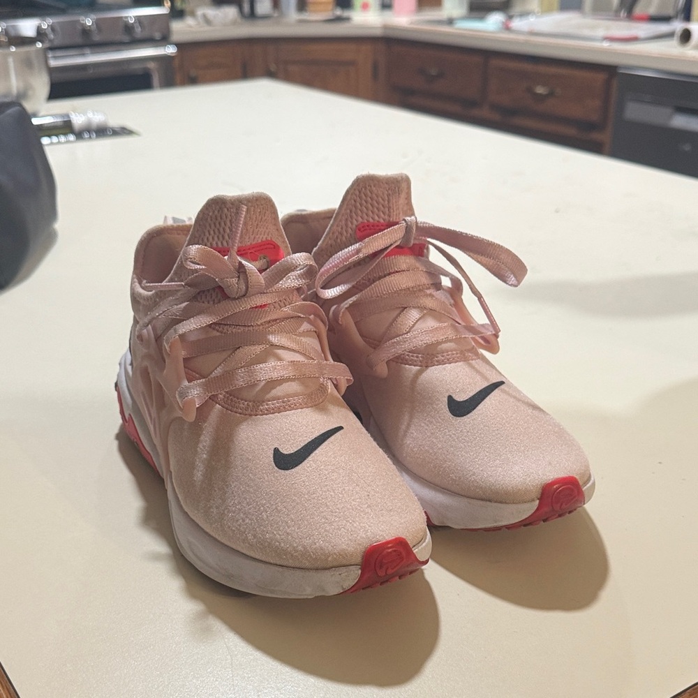 Nike Blush Pink Running Shoes with Black Swoosh